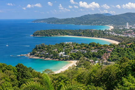 Elevated view of the bays around Kata and Karon, with green headlands and blue Andaman water