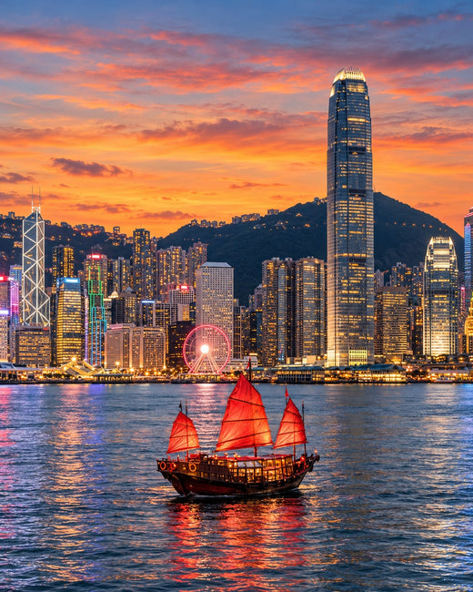 Hong Kong: Victoria Harbour and a red-sailed junk boat