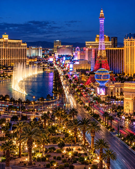 Las Vegas: illuminated Strip hotels and the Las Vegas welcome sign
