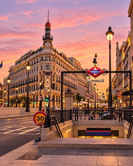 Madrid: Gran Vía and the Metrópolis Building at dusk