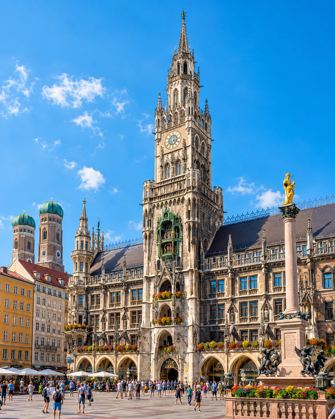 Munich: munich Marienplatz with ornate New Town Hall, colourful historic facades and clear blue sky