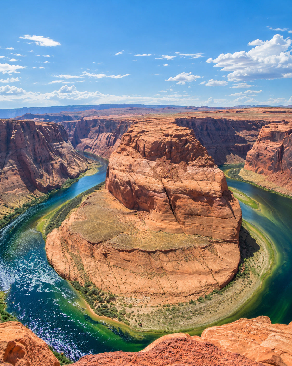 Page: Horseshoe Bend koło Page, szmaragdowa rzeka Kolorado i czerwone piaskowcowe klify